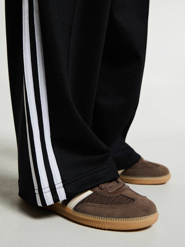 Adidas - Adicolor Baggy Fit Firebird Track Pants in Black