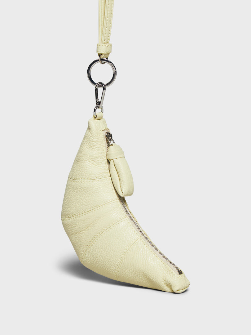 Lemaire - Croissant Coin Purse Necklace in Dusty Yellow