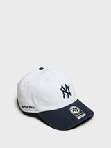 Sporty & Rich - Yankees Serif Hat in White and Dark Navy