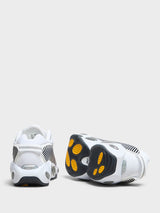 Nike - Nocta Glide Sneakers in White, White, Black and University Gold