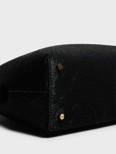 TOTEME - T-Lock Clutch in Black Pony Hair