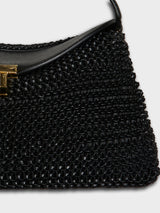 TOTEME - T-Lock Woven-Leather Clutch in Black