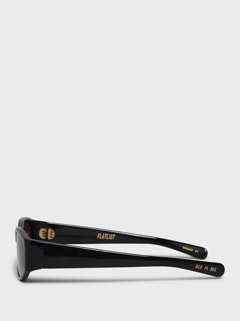 Eddie Kyu Solbriller i Solid Black og Solid Black Lens