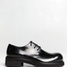 Acne Studios - Leather lace-up shoes in Black