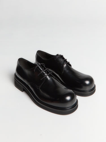 Acne Studios - Leather lace-up shoes in Black