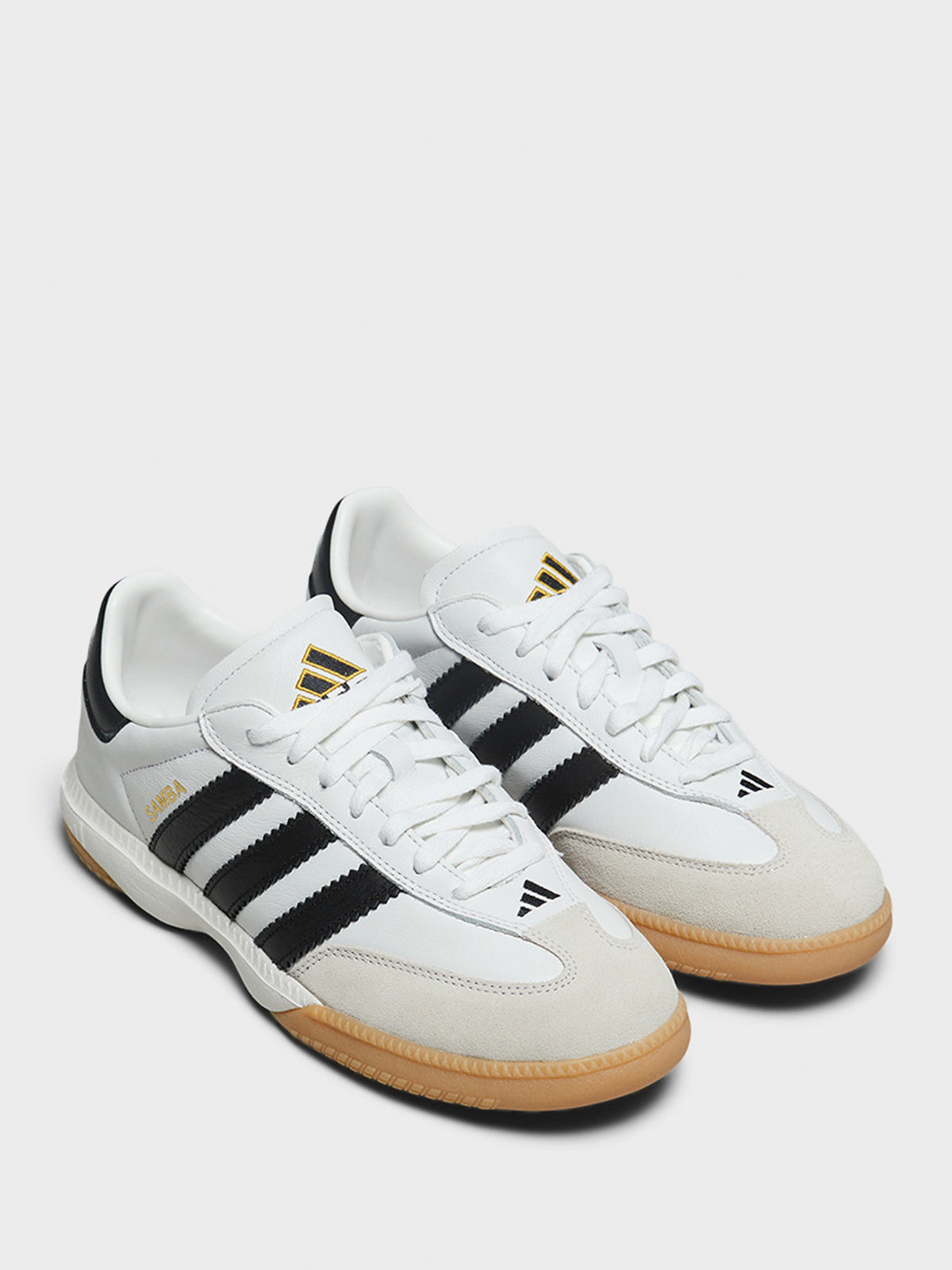 Samba MN Sneakers in White and Black