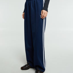 Adidas - Adicolor Baggy Fit Firebird Track Pants in Night Indigo