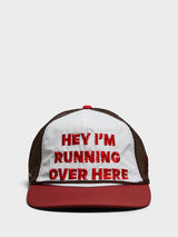 Alex Zono - Hey, I'm Running Over Here Trucker Cap in Brown