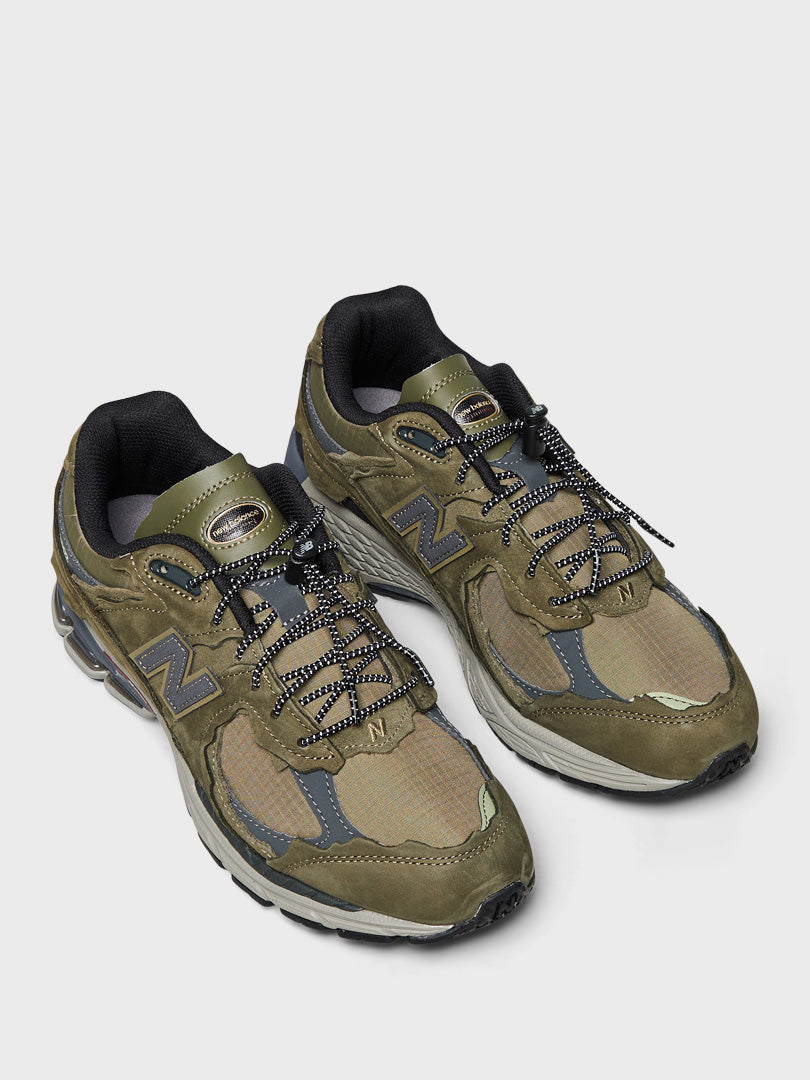 M2002RDN Protection Pack Sneakers in Dark Moss