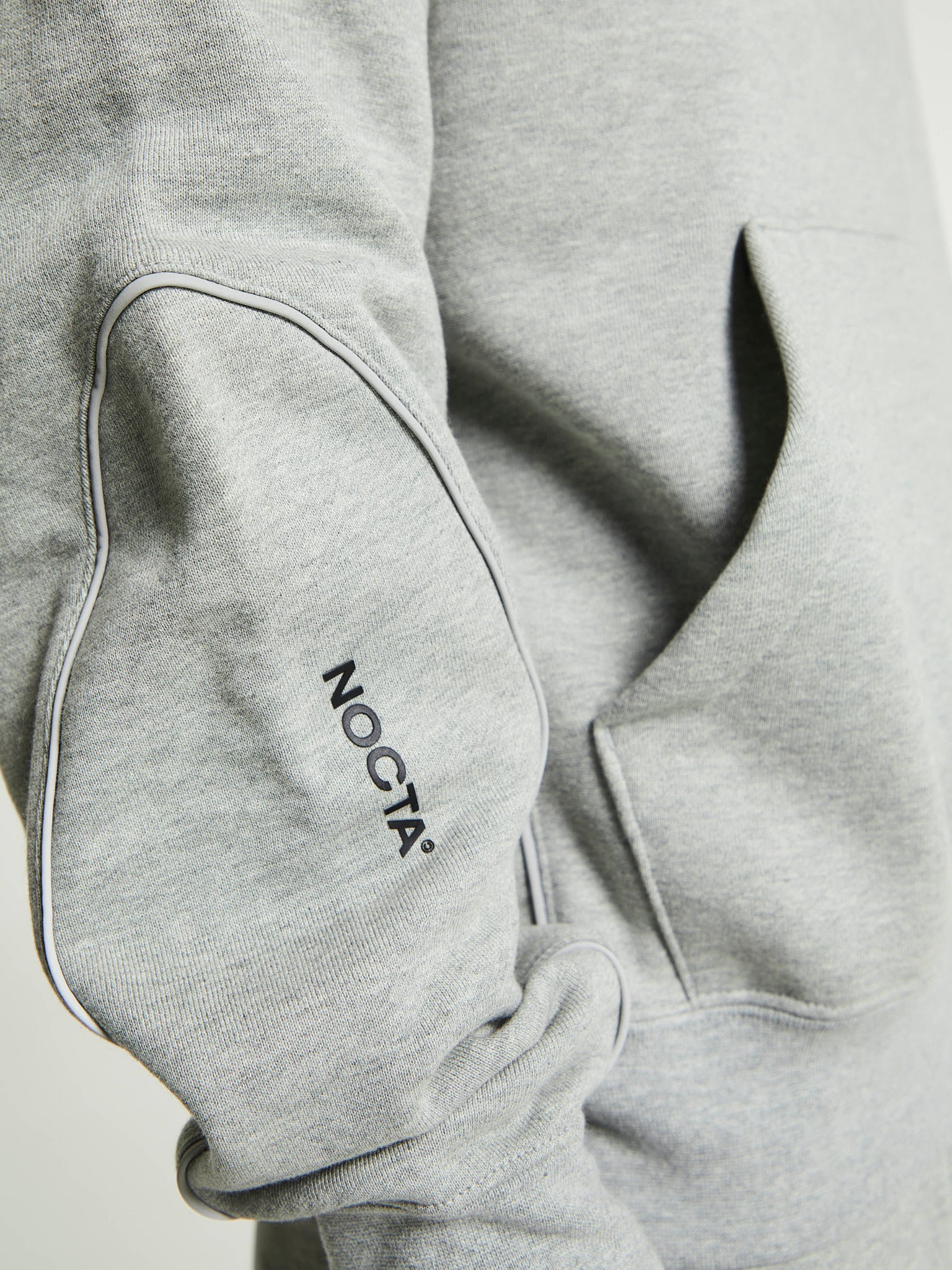 Nike - NOCTA Fleece Hoodie in Dark Heather Grey and Matte Silver