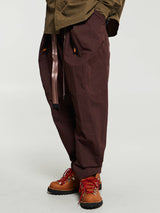 Nike - U ISPA ADPT WRAP Pants in Earth/Smokey Mauve