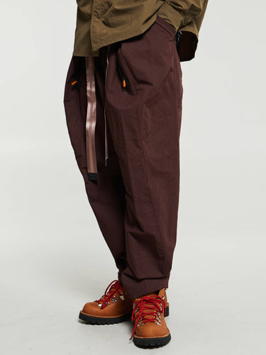 Nike - U ISPA ADPT WRAP Pants in Earth/Smokey Mauve