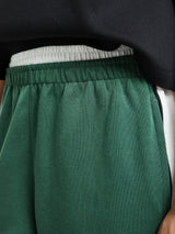 Nike - Shorts in Fir and Sail