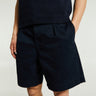 Noah - Single-Pleat Baggy Shorts in Navy