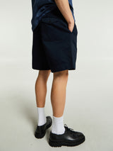 Noah - Single-Pleat Baggy Shorts in Navy