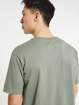 Pas Normal Studios - Off-Race Logo T-Shirt in Dark Celeste