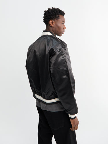 Patta - Script Logo Stain Varsity Jacket in Black