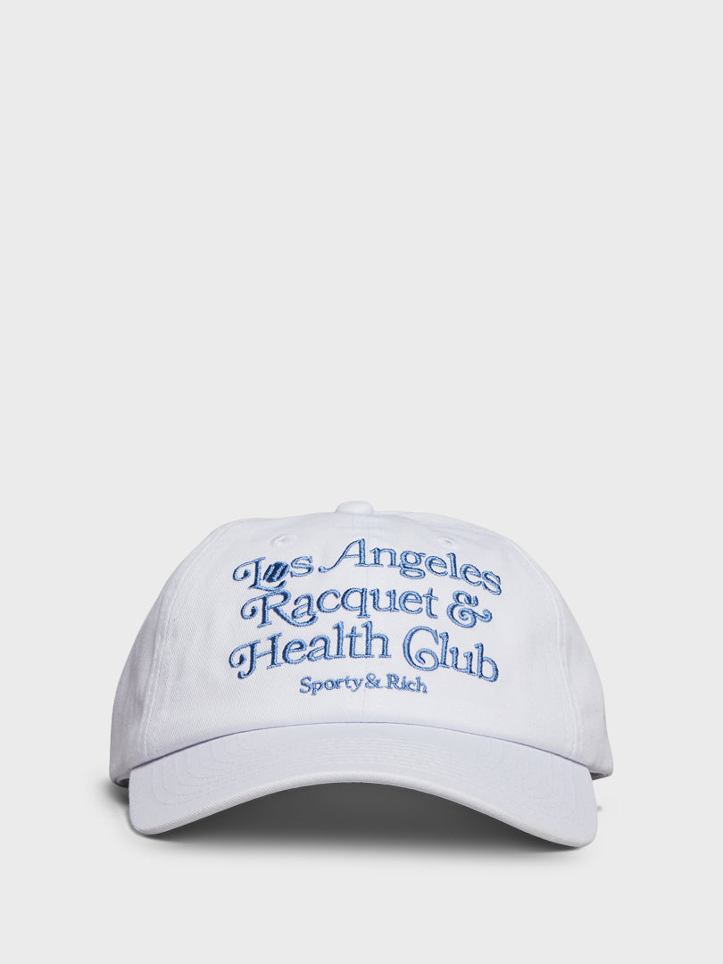    SPORTY & RICH - LA Racquet Club Hat in White and Steel Blue