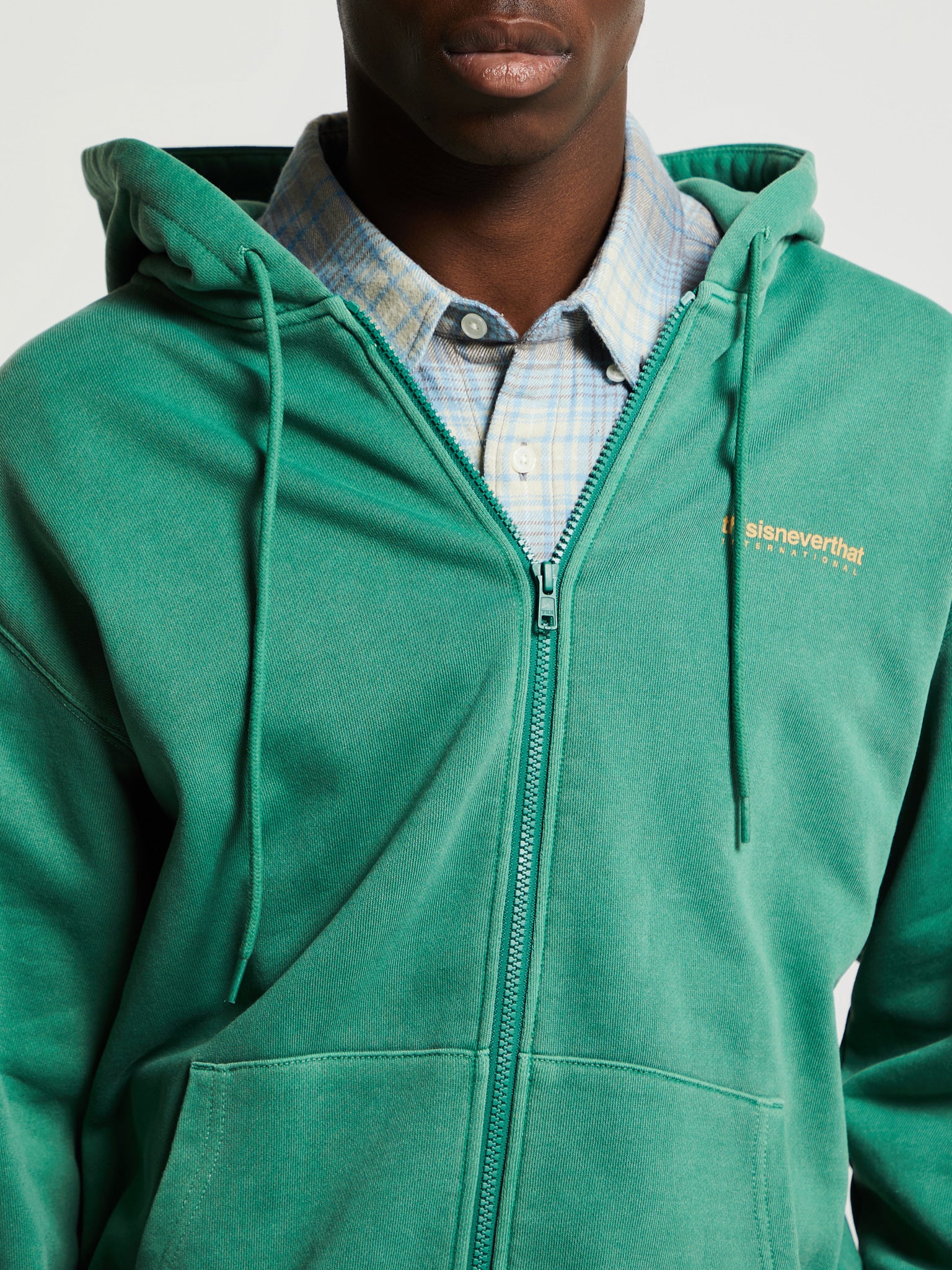 INTL. Logo Zip Up Hoodie in Deep Green
