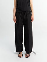 TOTEME - Drawstring Cotton Trousers in Black