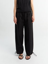 TOTEME - Drawstring Cotton Trousers in Black