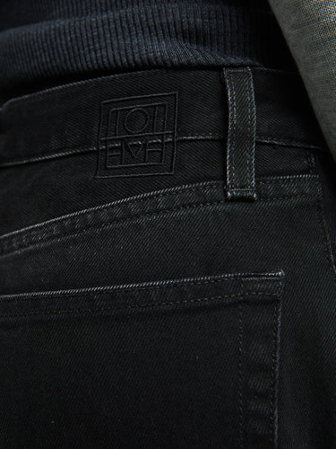 TOTEME - Twisted Seam Denim Full Length in Faded Black