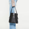 TOTEME - Belted Leather Bucket Bag in Black