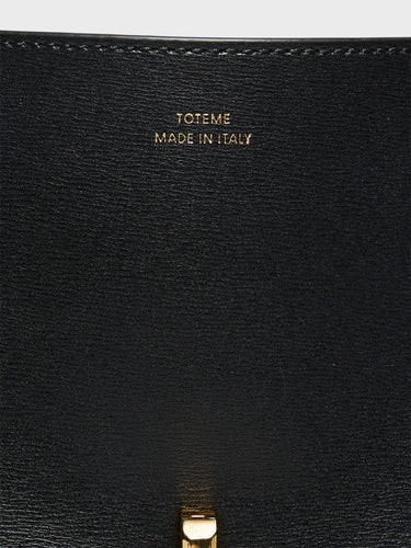 TOTEME - T-Lock Top Handle Bag in Black