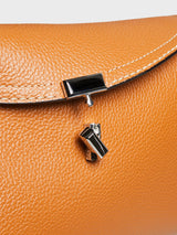 TOTEME - T-Lock Clutch in Tan