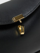 TOTEME - T-Lock Clutch in Black