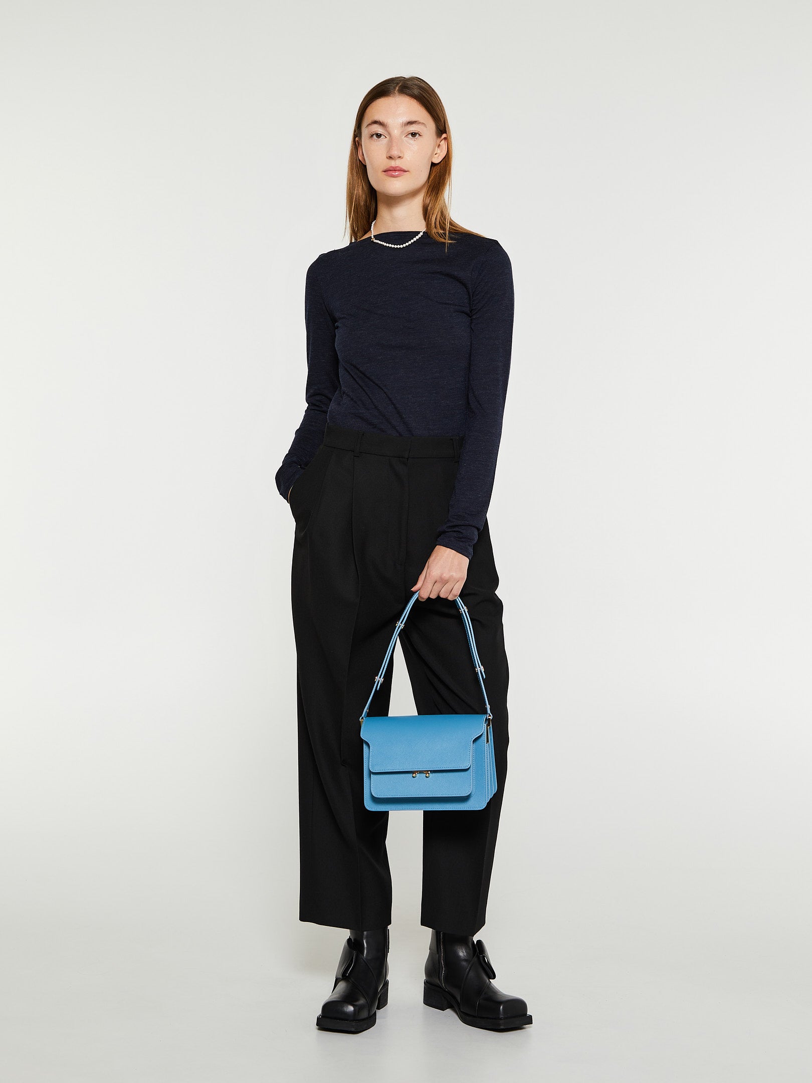 Double-Pleated Cropped Trousers in Black