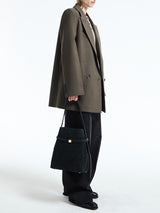 TOTEME - Belted Suede Bucket Bag in Black