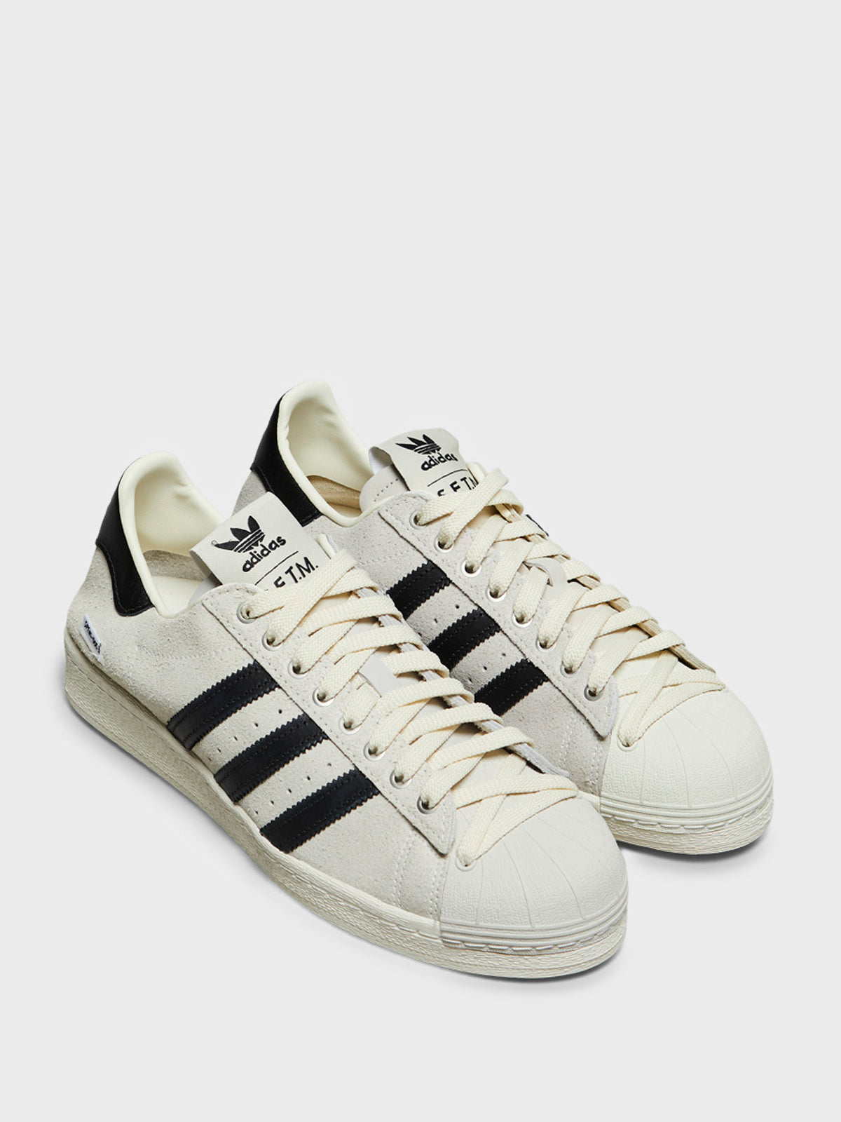 Adidas - Superstar 82 SFTM Sneakers in Cream White, Core Black and Off White