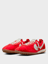 Nike - W Jacquemus Moon Shoe SP Sneakers in University Red, Cashmere, Bicycle Yellow, Gum Light Brown, Stormblue and Hydrogen Blue