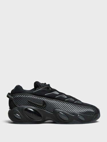 Nike - Nocta Glide Sneakers in Black, Black, Iron Grey and University Gold