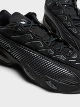 Nike - Nocta Glide Sneakers in Black, Black, Iron Grey and University Gold