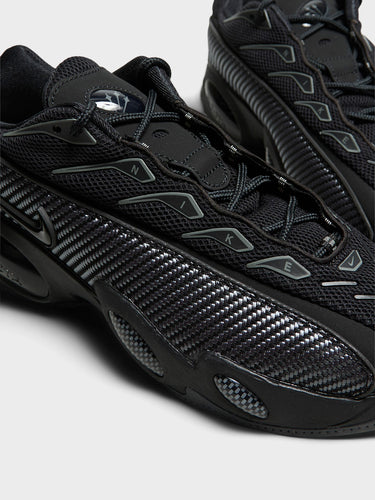 Nike - Nocta Glide Sneakers in Black, Black, Iron Grey and University Gold