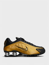 Nike - Shox R4 Sneakers in Black and Metallic Gold