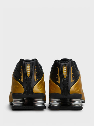 Nike - Shox R4 Sneakers in Black and Metallic Gold