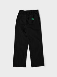 Palmes - Lucien Herringbone Trousers in Black