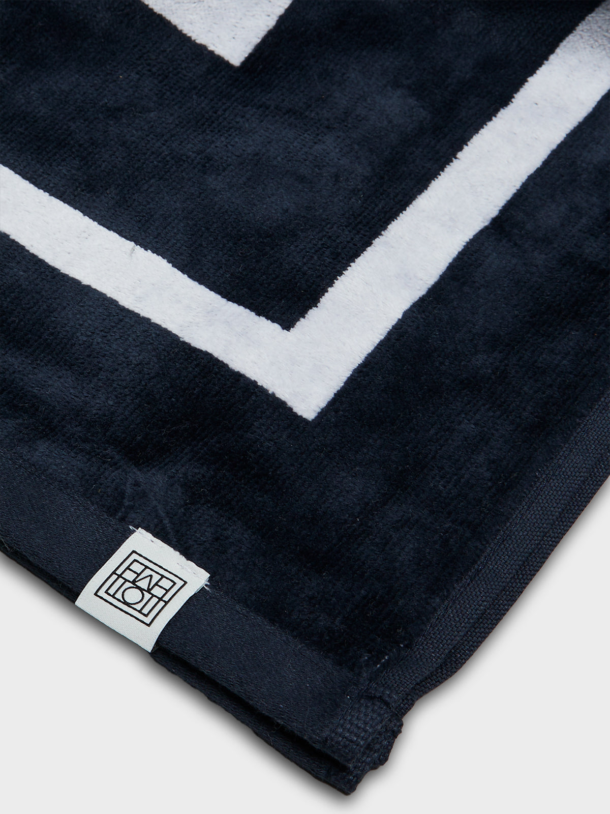 TOTEME - Monogram Jacquard Beach Towel in Navy