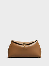 TOTEME - T-Lock Leather Clutch in Camel