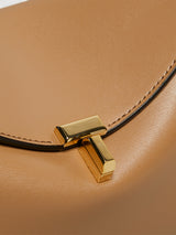 TOTEME - T-Lock Leather Clutch in Camel