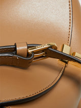 TOTEME - T-Lock Leather Clutch in Camel