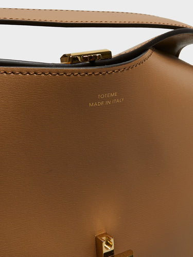 TOTEME - T-Lock Leather Top Handle Bag in Camel
