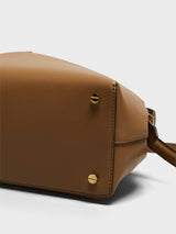 TOTEME - T-Lock Leather Top Handle Bag in Camel